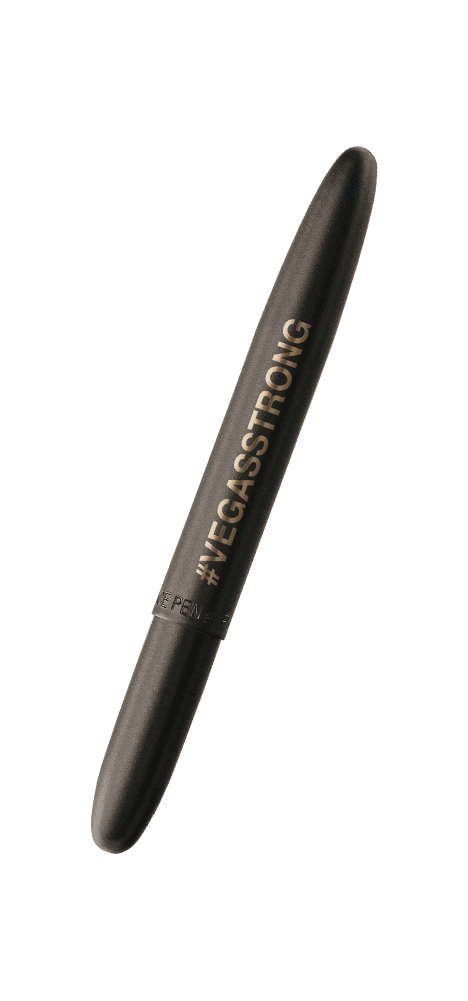 Closed 400BGVS matte black space pen with #VEGASSTRONG engraving