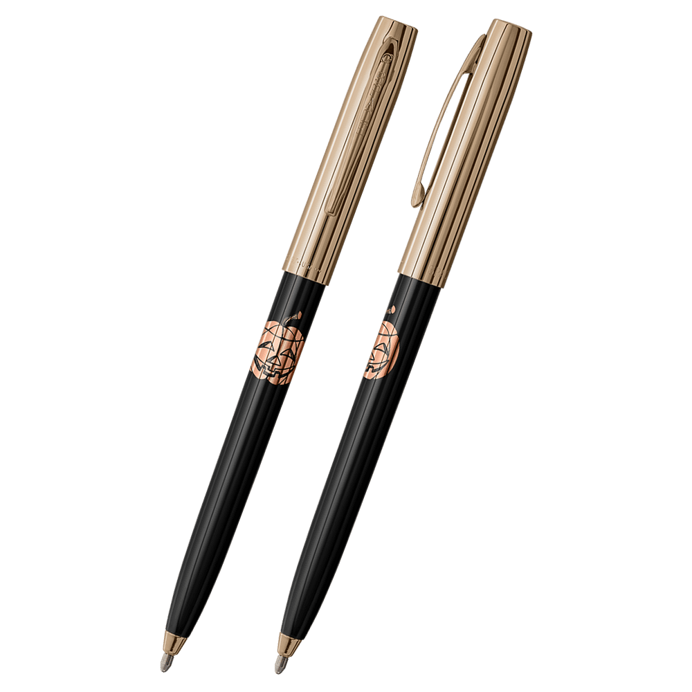 Front and side views of cap-o-matic space pen with black plastic barrel, gold colored cap with clip, gold colored tip, and imprinted copper jack-o-lantern.