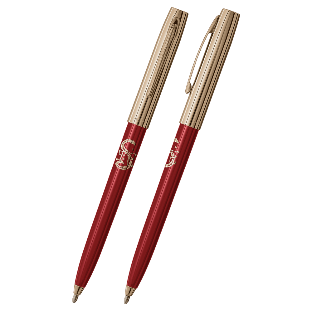 Front and side views of cap-o-matic space pen with red plastic barrel, gold colored cap with clip, gold colored tip, and imprinted gold Chinese character and snake.