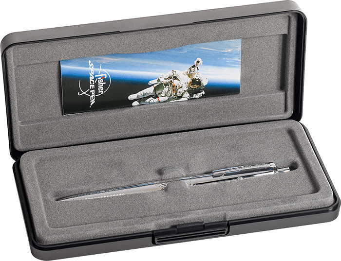 Chrome AG7-AR Original Astronaut Space Pen in its gift box. The outside of the box is black plastic. The inside has a flocked gray lining. Inside the lid is a Fisher Space Pen leaflet featuring an astronaut in space with Earth behind them and the Fisher S
