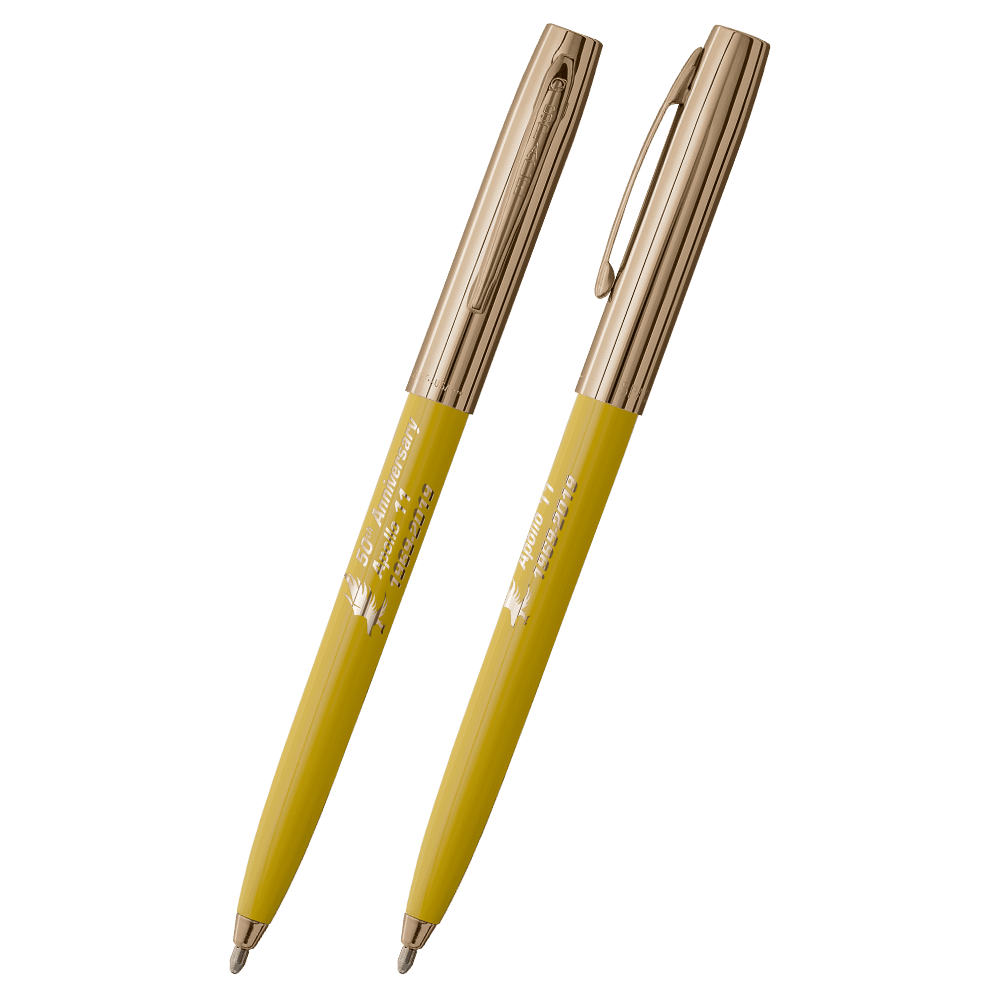 Front and side views of cap-o-matic space pen with yellow plastic barrel, gold colored cap with clip, gold colored tip, and imprinted gold Apollo 11 50th Anniversary.